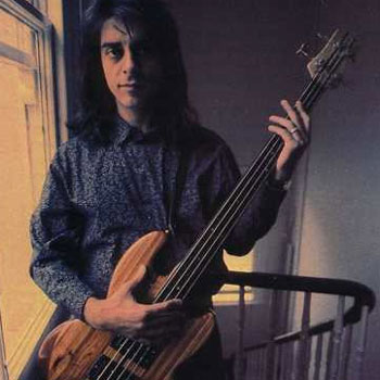 Mick Karn playing fretless bass guitar