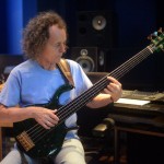 Mark Egan playing fretless bass guitar