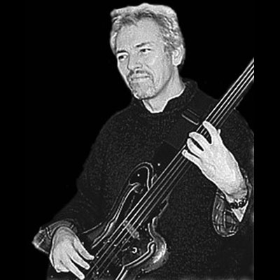 John Giblin playing fretless bass