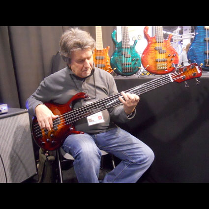 Tim Landers playing fretless bass guitar