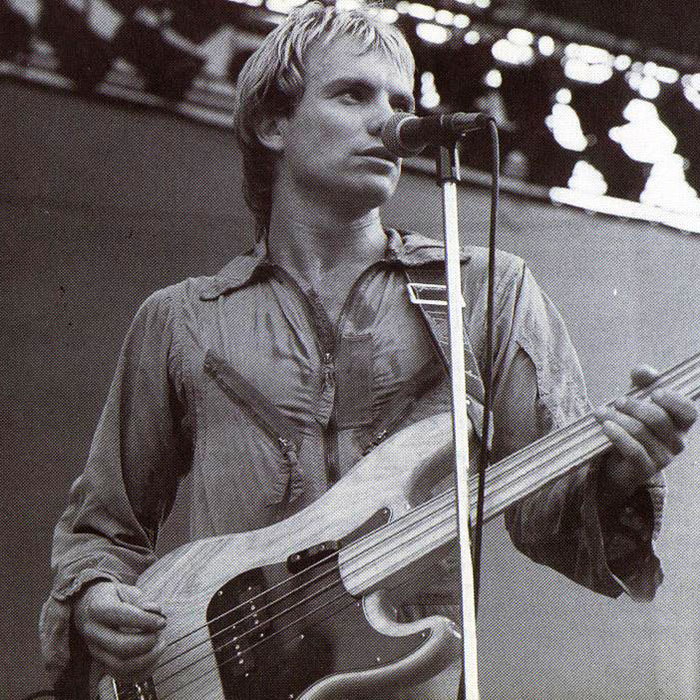 Sting playing fretless bass guitar